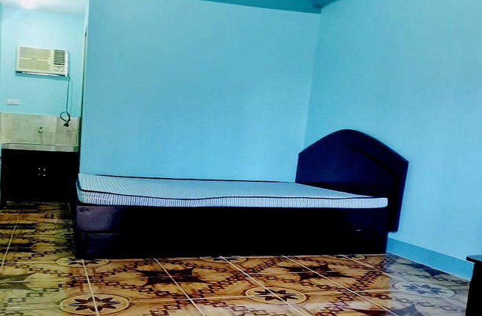 Imagen de la habitación del Hotel OYO 833 Ln Apartelle. Foto 5