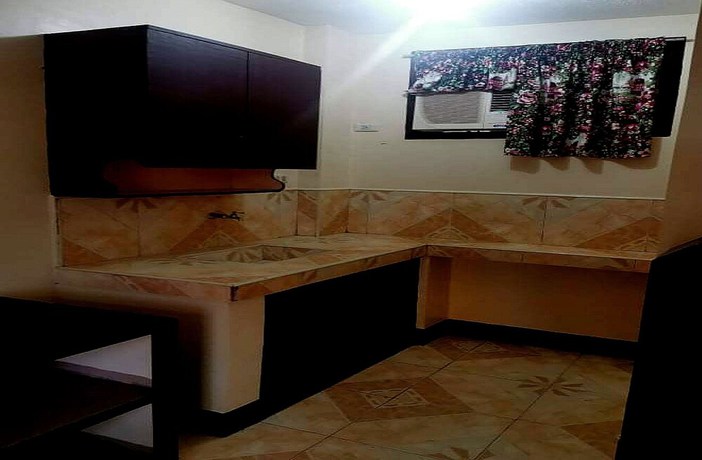 Imagen de la habitación del Hotel OYO 833 Ln Apartelle. Foto 8