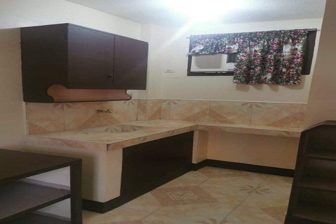 Imagen de la habitación del Hotel OYO 833 Ln Apartelle. Foto 9