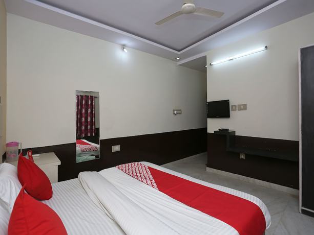 Imagen de la habitación del Hotel OYO 8391 Sanjog Resort. Foto 3