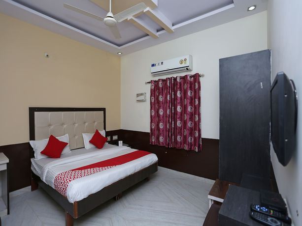 Imagen de la habitación del Hotel OYO 8391 Sanjog Resort. Foto 11