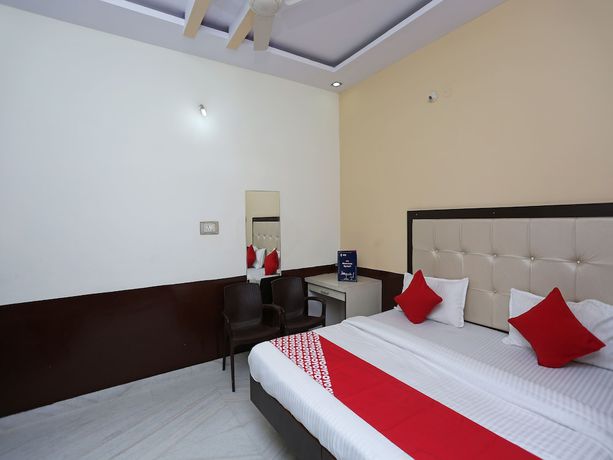 Imagen de la habitación del Hotel OYO 8391 Sanjog Resort. Foto 13