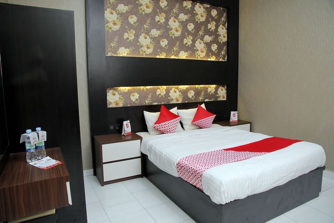 Imagen de la habitación del Hotel OYO 840 Dely. Foto 4