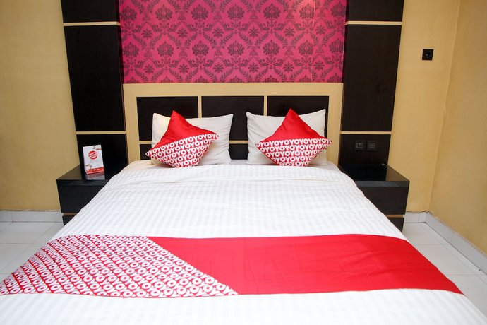 Imagen de la habitación del Hotel OYO 840 Dely. Foto 5