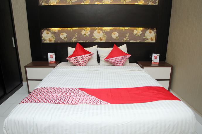 Imagen de la habitación del Hotel OYO 840 Dely. Foto 6