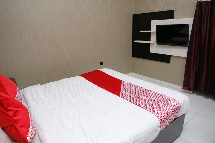 Imagen de la habitación del Hotel OYO 840 Dely. Foto 7