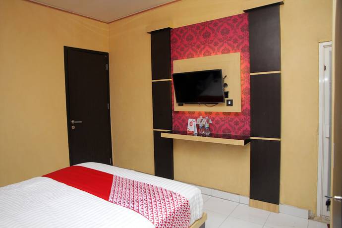 Imagen de la habitación del Hotel OYO 840 Dely. Foto 10