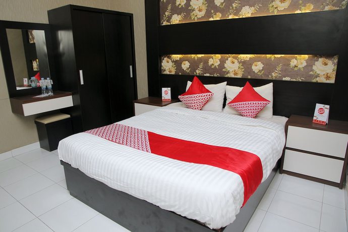 Imagen de la habitación del Hotel OYO 840 Dely. Foto 12