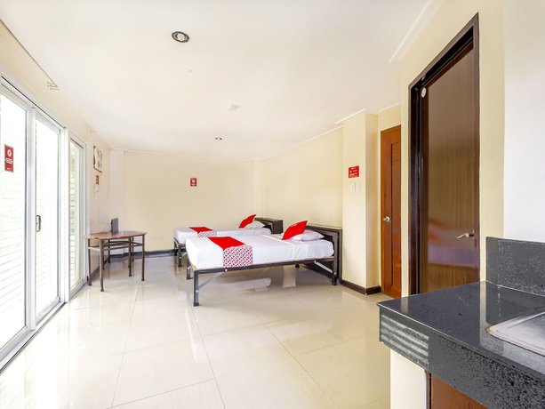 Imagen de la habitación del Hotel OYO 842 City Smiles Apartelle. Foto 3