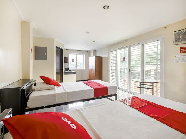 Imagen de la habitación del Hotel OYO 842 City Smiles Apartelle. Foto 11