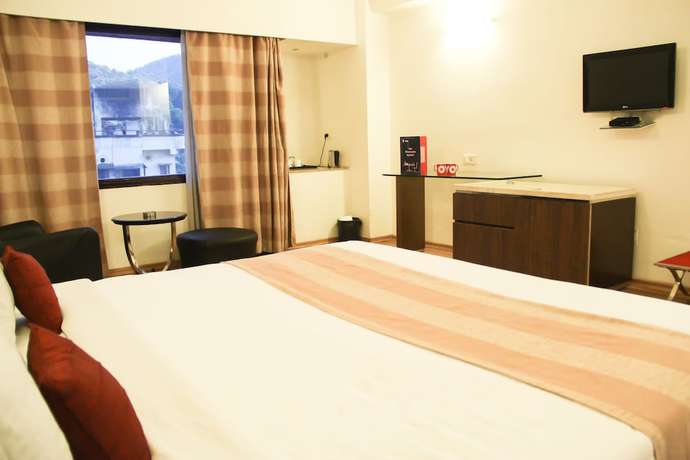 Imagen de la habitación del Hotel OYO 8450 Grand Starline. Foto 11