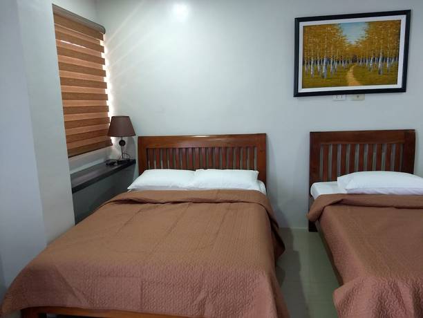 Imagen de la habitación del Hotel OYO 848 Dona Aurora Condotel. Foto 3