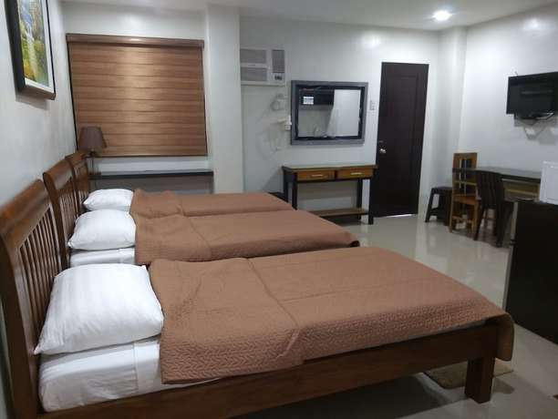 Imagen de la habitación del Hotel OYO 848 Dona Aurora Condotel. Foto 4