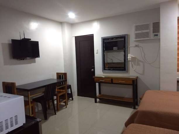 Imagen de la habitación del Hotel OYO 848 Dona Aurora Condotel. Foto 7