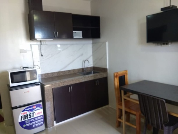 Imagen de la habitación del Hotel OYO 848 Dona Aurora Condotel. Foto 9