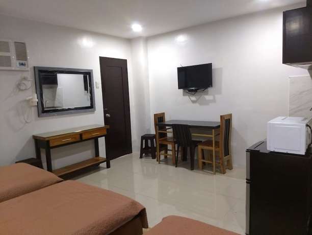 Imagen de la habitación del Hotel OYO 848 Dona Aurora Condotel. Foto 10