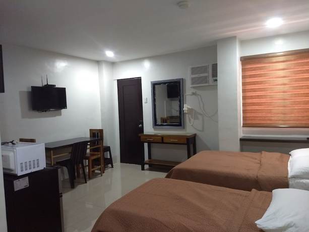 Imagen de la habitación del Hotel OYO 848 Dona Aurora Condotel. Foto 12