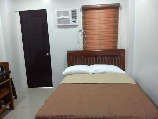 Imagen de la habitación del Hotel OYO 848 Dona Aurora Condotel. Foto 13