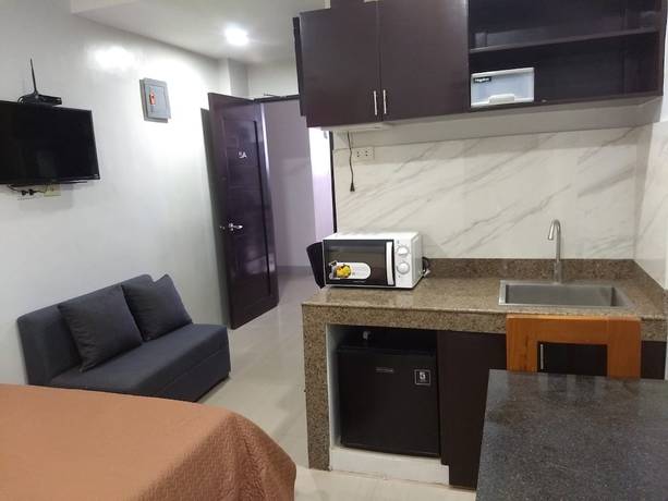 Imagen de la habitación del Hotel OYO 848 Dona Aurora Condotel. Foto 14