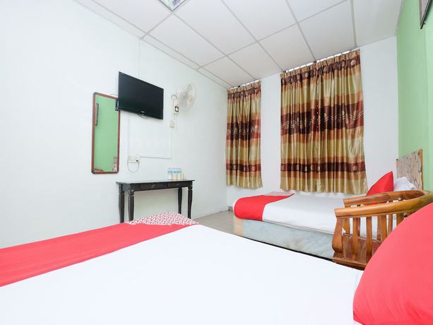 Imagen de la habitación del Hotel OYO 850 Gold Star Hotel. Foto 2