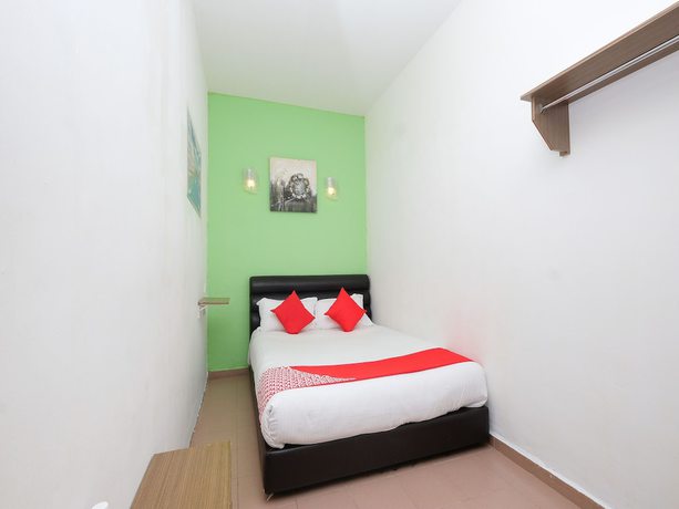 Imagen de la habitación del Hotel OYO 850 Gold Star Hotel. Foto 3