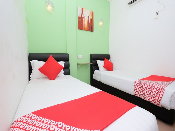Imagen de la habitación del Hotel OYO 850 Gold Star Hotel. Foto 4