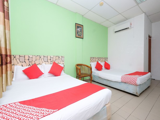 Imagen de la habitación del Hotel OYO 850 Gold Star Hotel. Foto 5
