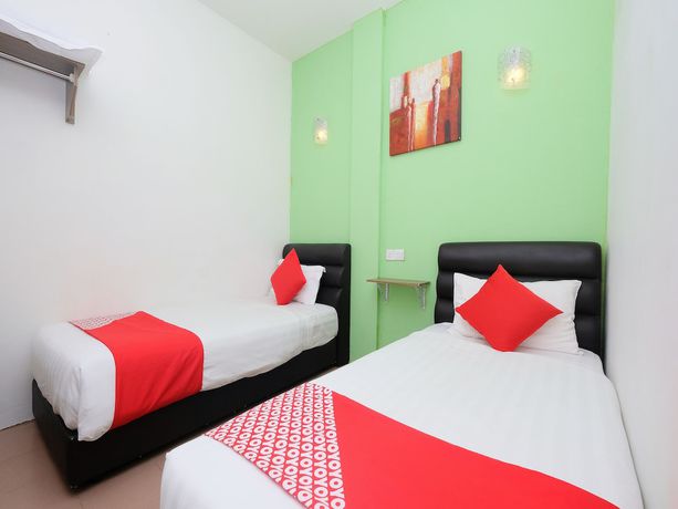 Imagen de la habitación del Hotel OYO 850 Gold Star Hotel. Foto 6