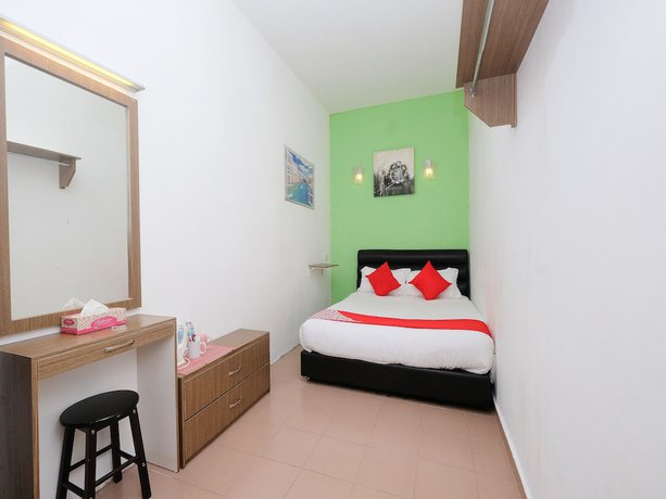 Imagen de la habitación del Hotel OYO 850 Gold Star Hotel. Foto 8