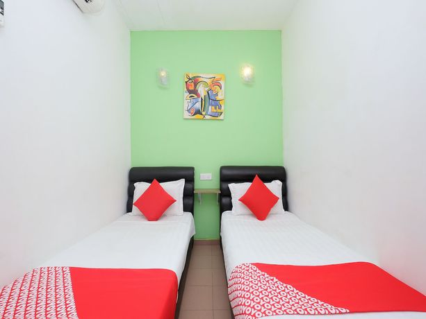 Imagen de la habitación del Hotel OYO 850 Gold Star Hotel. Foto 9