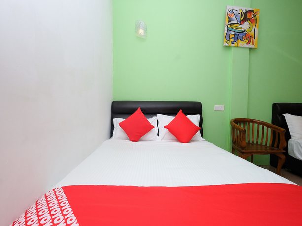 Imagen de la habitación del Hotel OYO 850 Gold Star Hotel. Foto 10