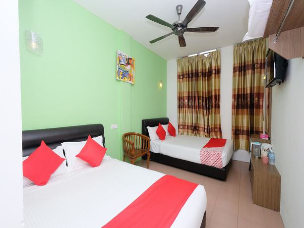 Imagen de la habitación del Hotel OYO 850 Gold Star Hotel. Foto 14