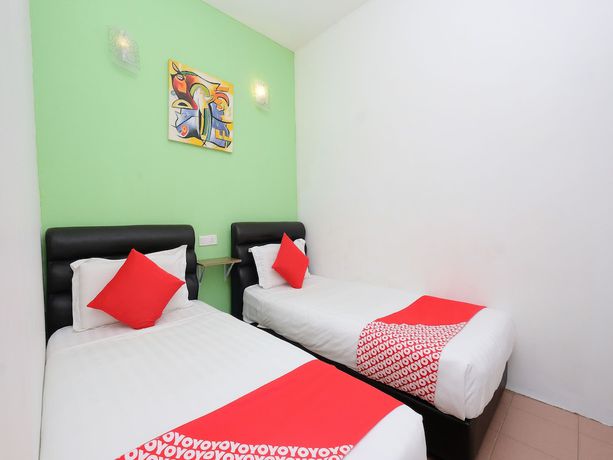 Imagen de la habitación del Hotel OYO 850 Gold Star Hotel. Foto 17