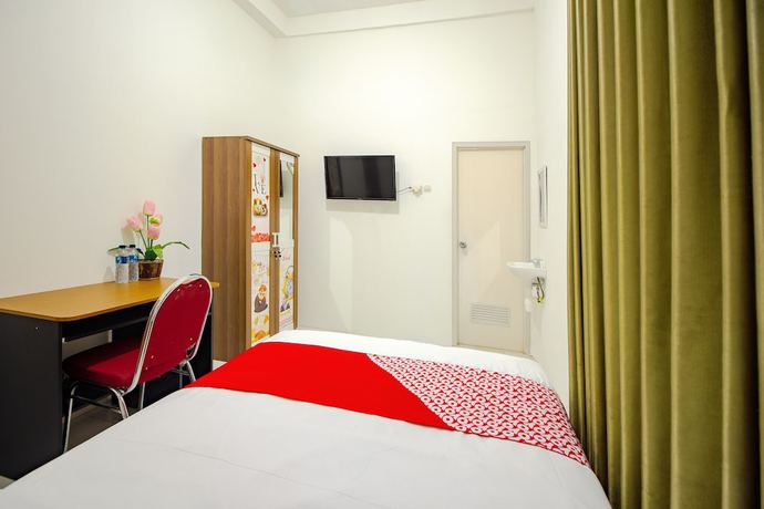 Imagen de la habitación del Hotel OYO 851 Rumah Mumu Kost and Homestay. Foto 3