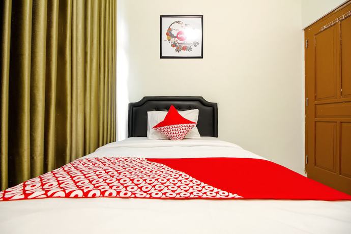 Imagen de la habitación del Hotel OYO 851 Rumah Mumu Kost and Homestay. Foto 9