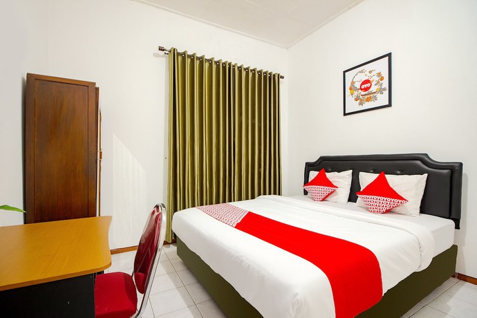 Imagen de la habitación del Hotel OYO 851 Rumah Mumu Kost and Homestay. Foto 11