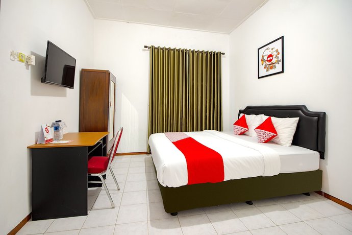 Imagen de la habitación del Hotel OYO 851 Rumah Mumu Kost and Homestay. Foto 12