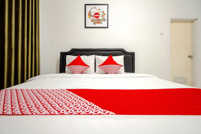 Imagen de la habitación del Hotel OYO 851 Rumah Mumu Kost and Homestay. Foto 14