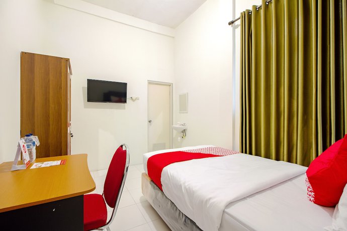 Imagen de la habitación del Hotel OYO 851 Rumah Mumu Kost and Homestay. Foto 15