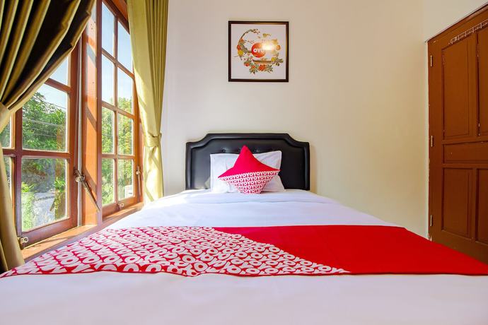 Imagen de la habitación del Hotel OYO 851 Rumah Mumu Kost and Homestay. Foto 16