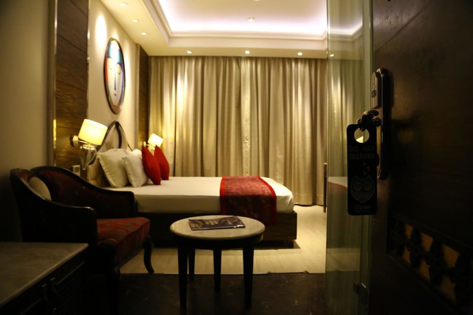 Imagen de la habitación del Hotel OYO 857 The First. Foto 4