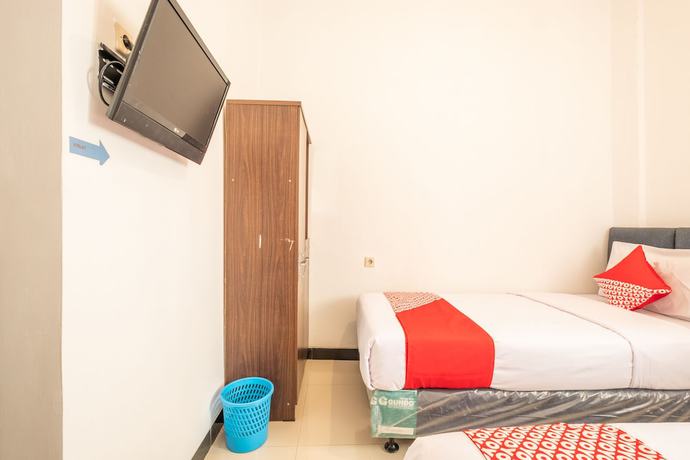 Imagen de la habitación del Hotel OYO 863 Tenacity Guest House Syariah. Foto 2