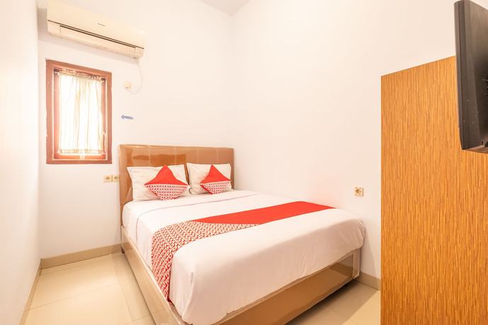 Imagen de la habitación del Hotel OYO 863 Tenacity Guest House Syariah. Foto 3