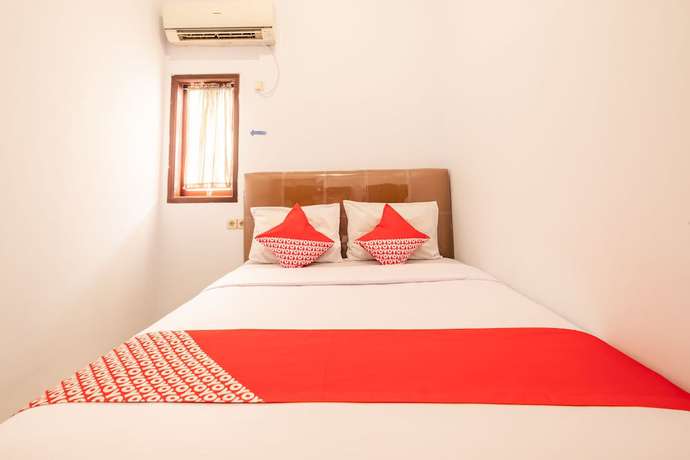 Imagen de la habitación del Hotel OYO 863 Tenacity Guest House Syariah. Foto 4