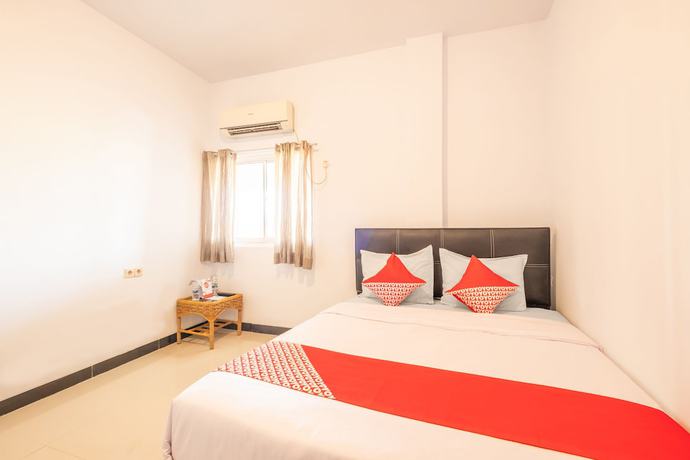 Imagen de la habitación del Hotel OYO 863 Tenacity Guest House Syariah. Foto 5