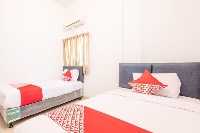 Imagen de la habitación del Hotel OYO 863 Tenacity Guest House Syariah. Foto 6