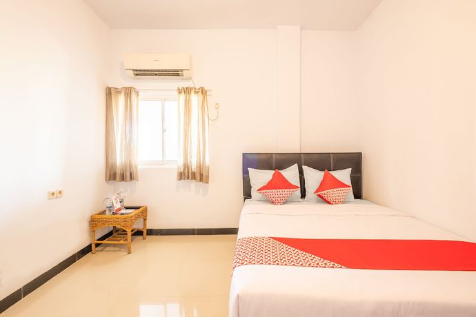 Imagen de la habitación del Hotel OYO 863 Tenacity Guest House Syariah. Foto 13