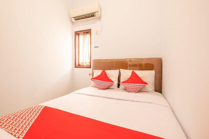 Imagen de la habitación del Hotel OYO 863 Tenacity Guest House Syariah. Foto 14