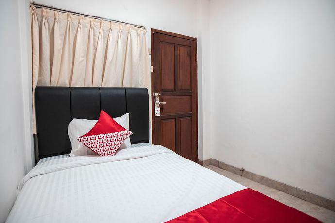 Imagen de la habitación del Hotel OYO 868 Wisma Berkat. Foto 2