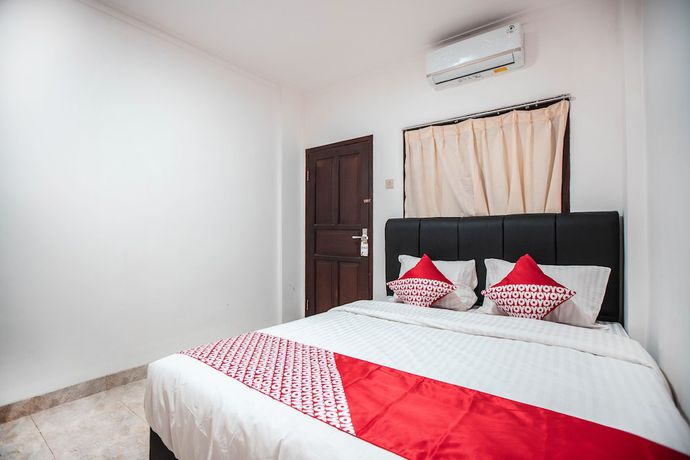 Imagen de la habitación del Hotel OYO 868 Wisma Berkat. Foto 3